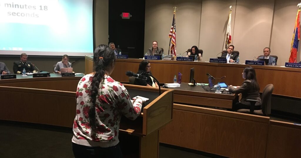 Volunteer Manveer Chaihal addresses the Downey City Council in support of DFYL