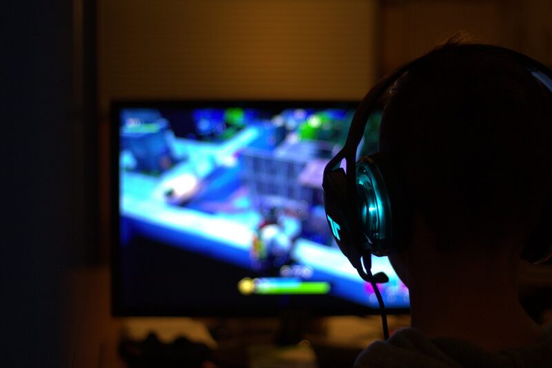 adult playing video game