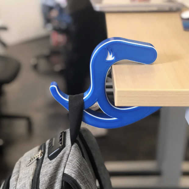 Blue bag holder on desk