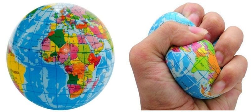 globe-stress-balls A rubber stress ball that looks like planet Earth and a hand squeezing one of them