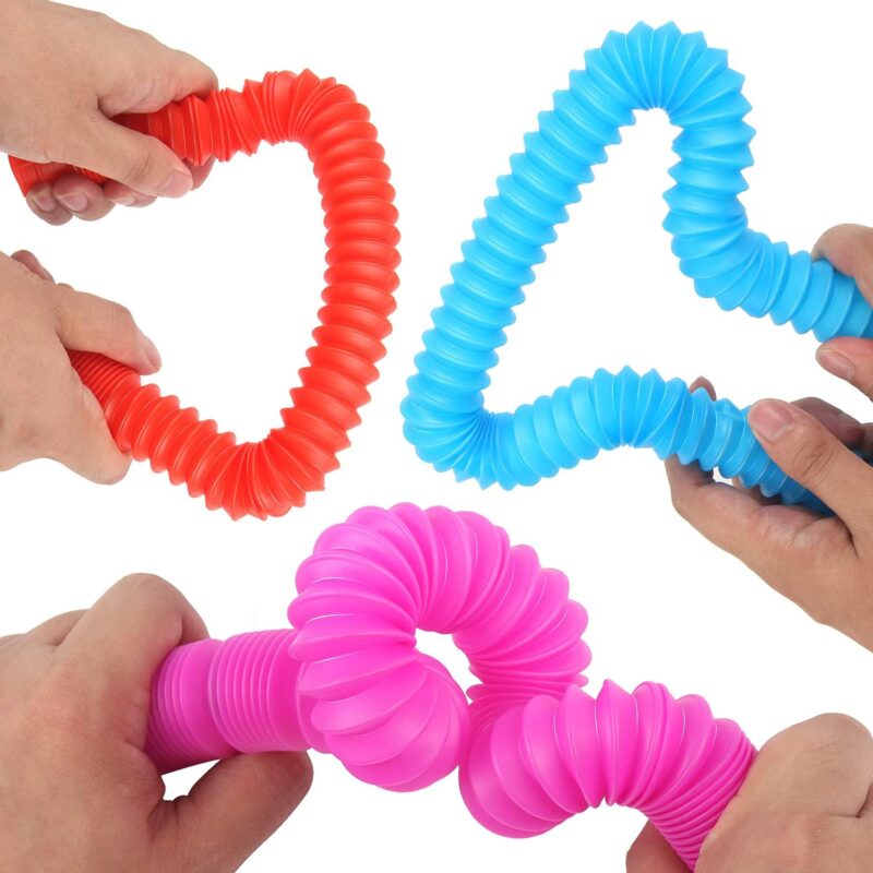 bendy-tubes Children holding bright plastic bendable tubes as an example of inexpensive gift ideas for students