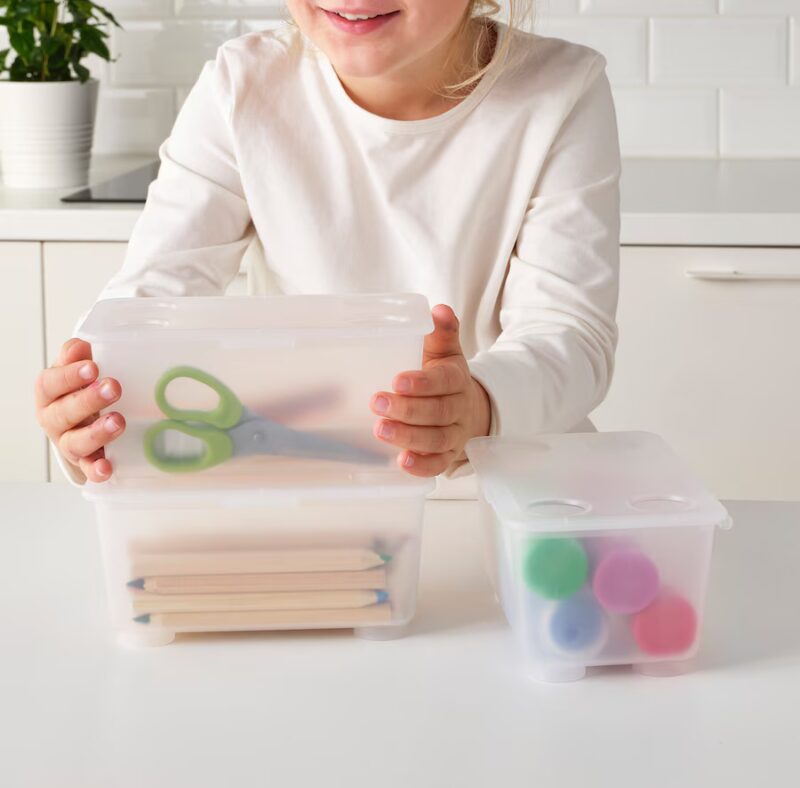 Ikea classroom ideas: pink and turquoise boxes with lids for storing school supplies