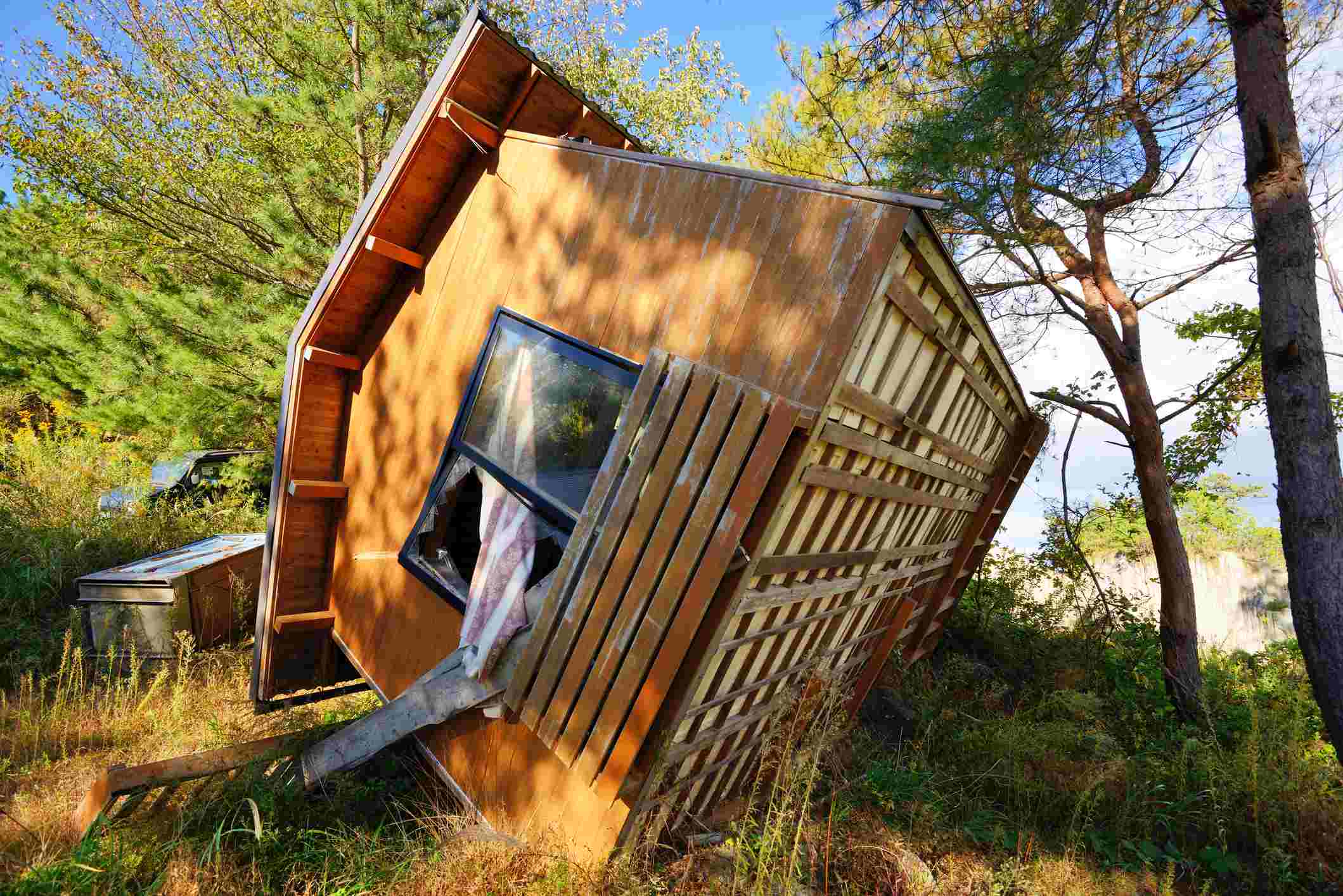 Picture Writing Prompt: Tipped House Matsushima, Japan - October 29, 2012: An overturned home damaged by the Tohoku Earthquake and Tsunami.