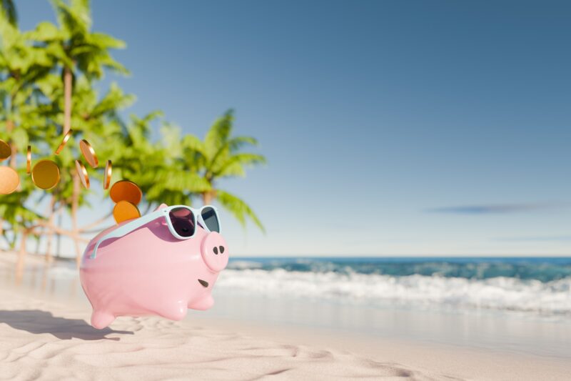 Picture Prompts: Beach Piggy A piggy bank runs along the beach toward the water, shedding coins