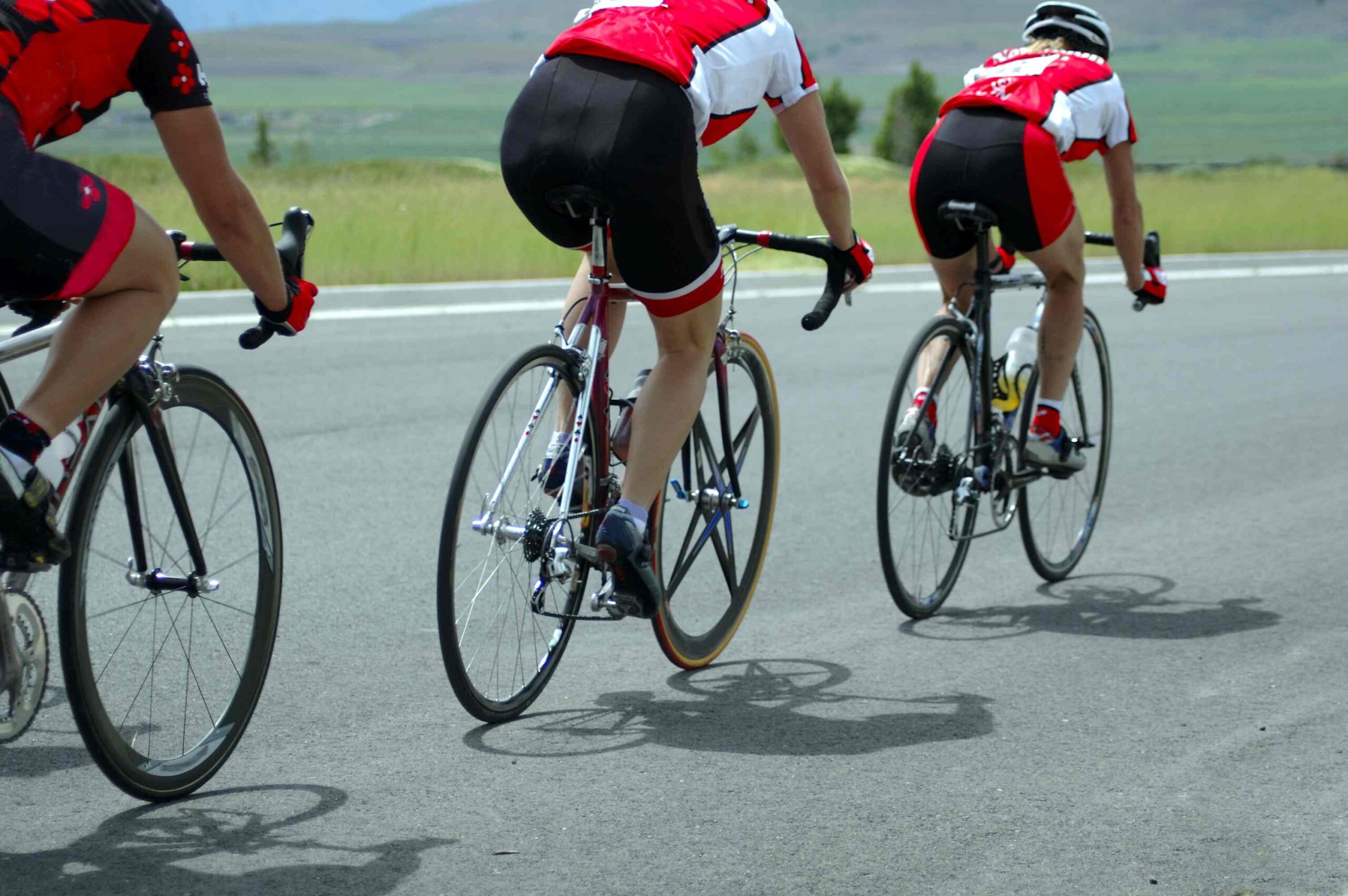 Picture Writing Prompts: The Race Three bike riders race toward the finish line