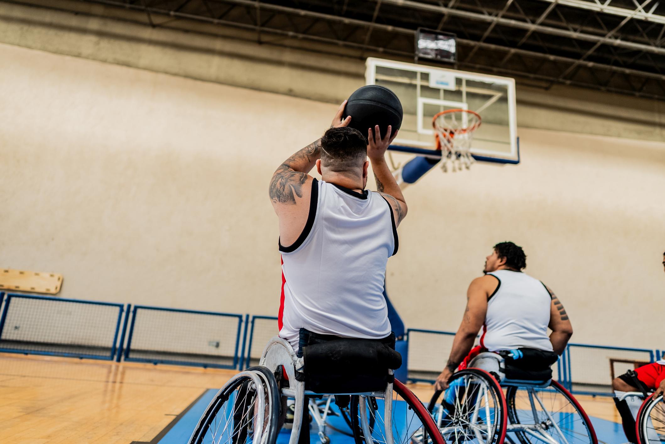 Writing Prompts: Basketball Wheelchair basketball players playing on a sport court