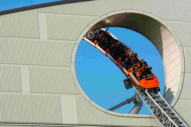 Picture Prompts: Roller Coaster Roller Coaster coming through a hole in a wall