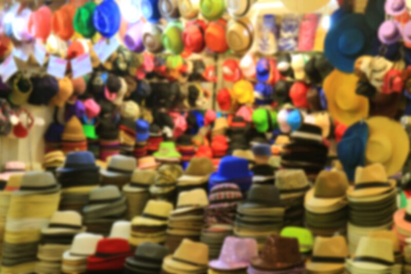 Picture Writing Prompts: Hat Store Blurred image of a store full of hats