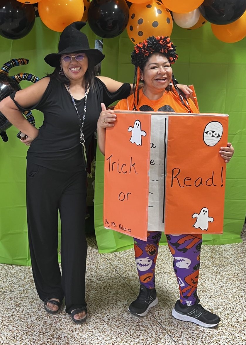 Teacher dressed in a homemade book costume for Halloween