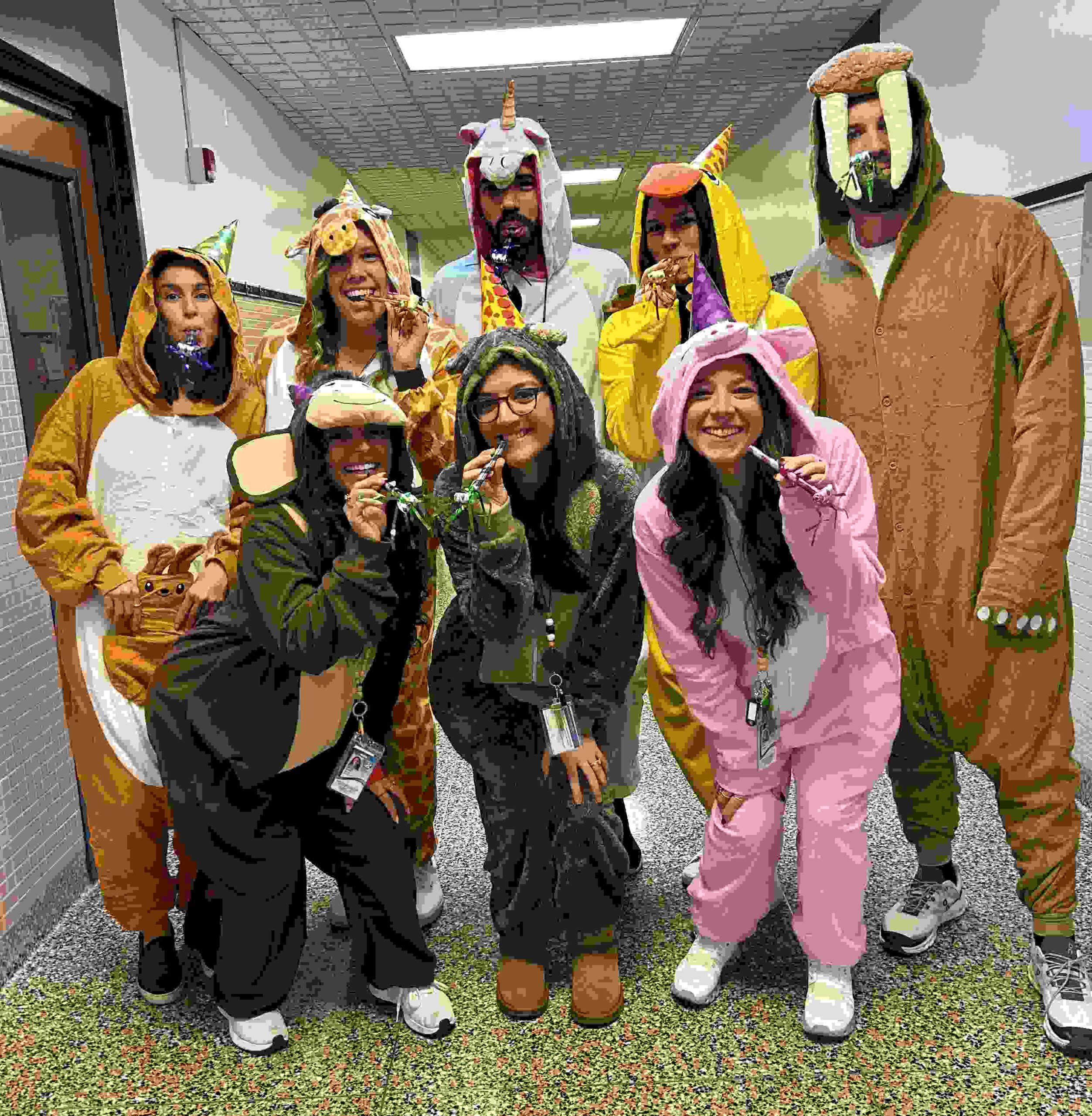 Teachers dressed as Party Animals for Halloween