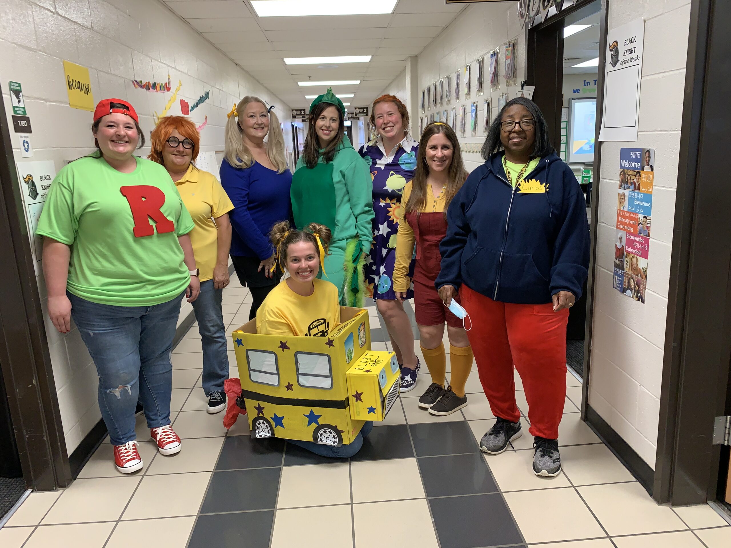 Teachers dressed as characters from The Magic Schoolbus