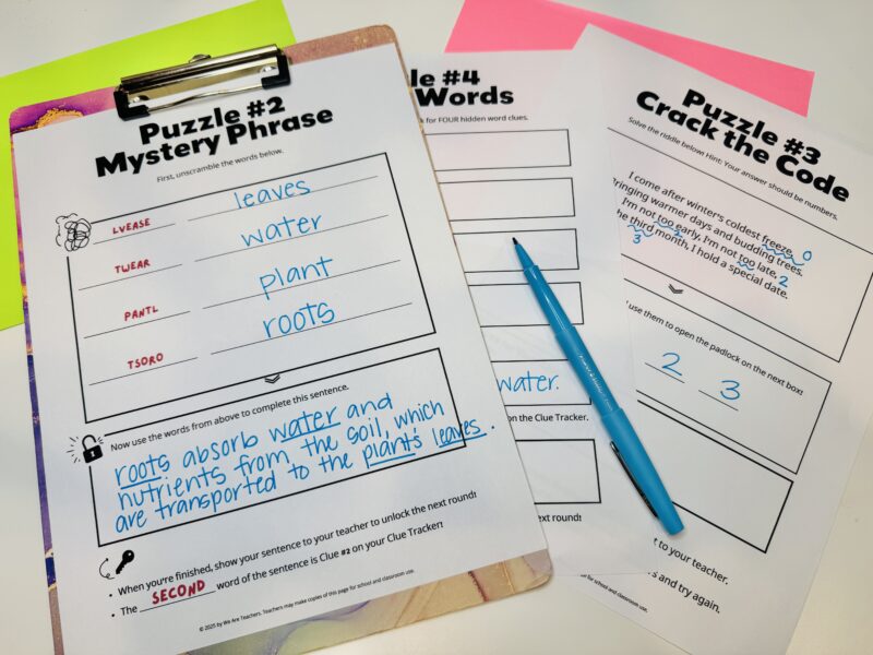 three escape room printable examples with a blue pen