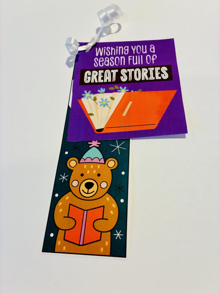 holiday gift tag example for a student gift called wishing you a season full of great stories along with a winter bookmark