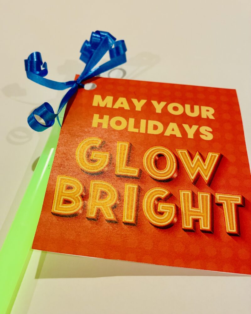holiday gift tag example for a student gift called may your holidays glow bright and students receive a glow stick and a holiday gift tag