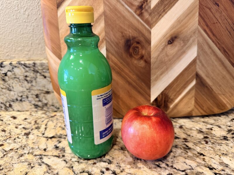 an image of a first grade science experiment: apples