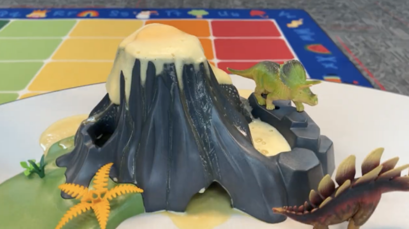 an image of a first grade science experiment: volcano