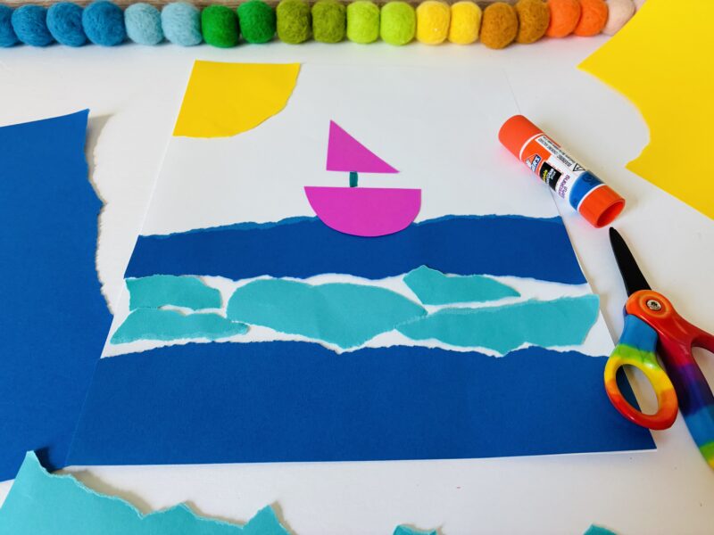 Summer Crafts for Kids a summer craft for kids that involves using torn up paper to create an ocean scene